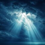 Light rays breaking through dark storm clouds