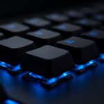 Close-up of a keyboard with blue backlight