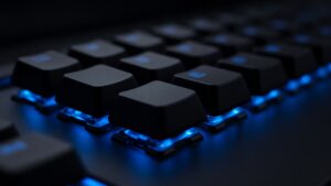 Close-up of a keyboard with blue backlight