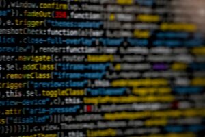 Close-up of highlighted code on a monitor