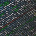 Lines of code on a dark monitor
