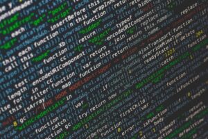 Lines of code on a dark monitor