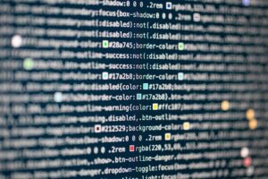 Close-up of code on a dark screen