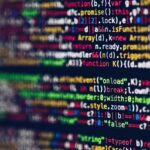 Dense colorful source code on a screen