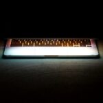Keyboard lit from below in darkness