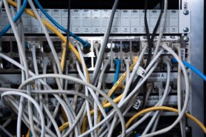 Tangle of network cables in a server rack