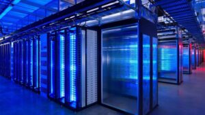Data center aisle lit in blue