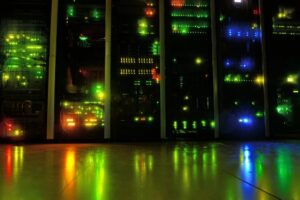 Server rack with green status lights in the dark